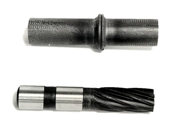 Reamer on a white background: welded blank with flash, and the finished spiral-fluted reamer below